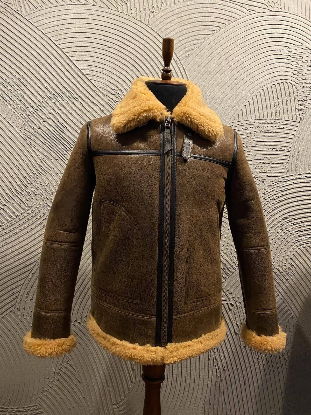 Mayfair Shearling Bomber — front view on atelier mannequin