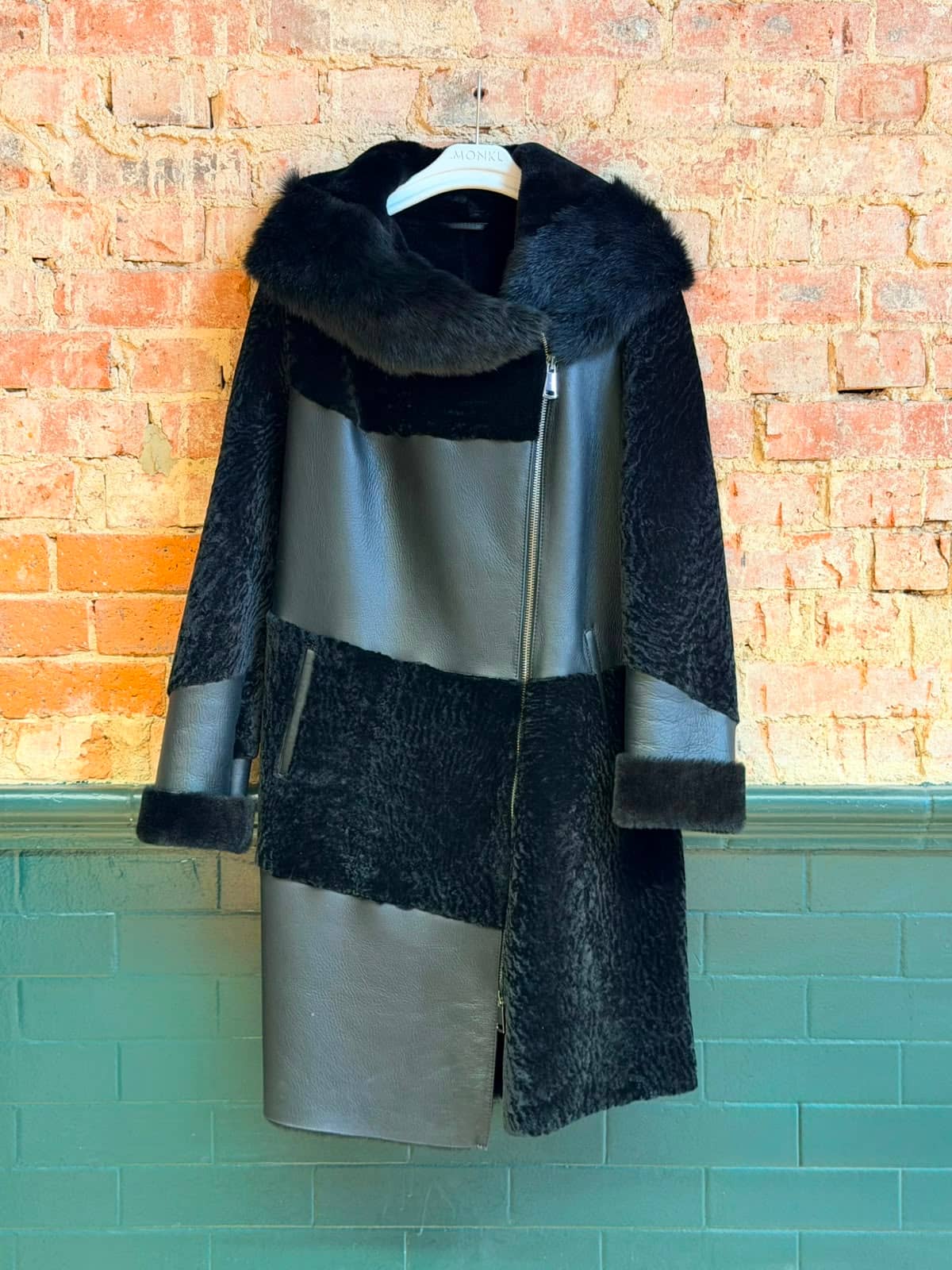 Covent Garden Weekender — side profile showing shearling collar and leather grain