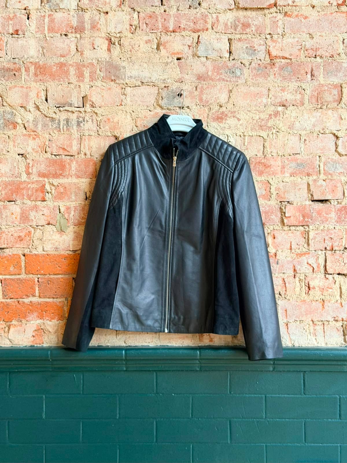 Hampstead Travel Pouch — front view on atelier mannequin