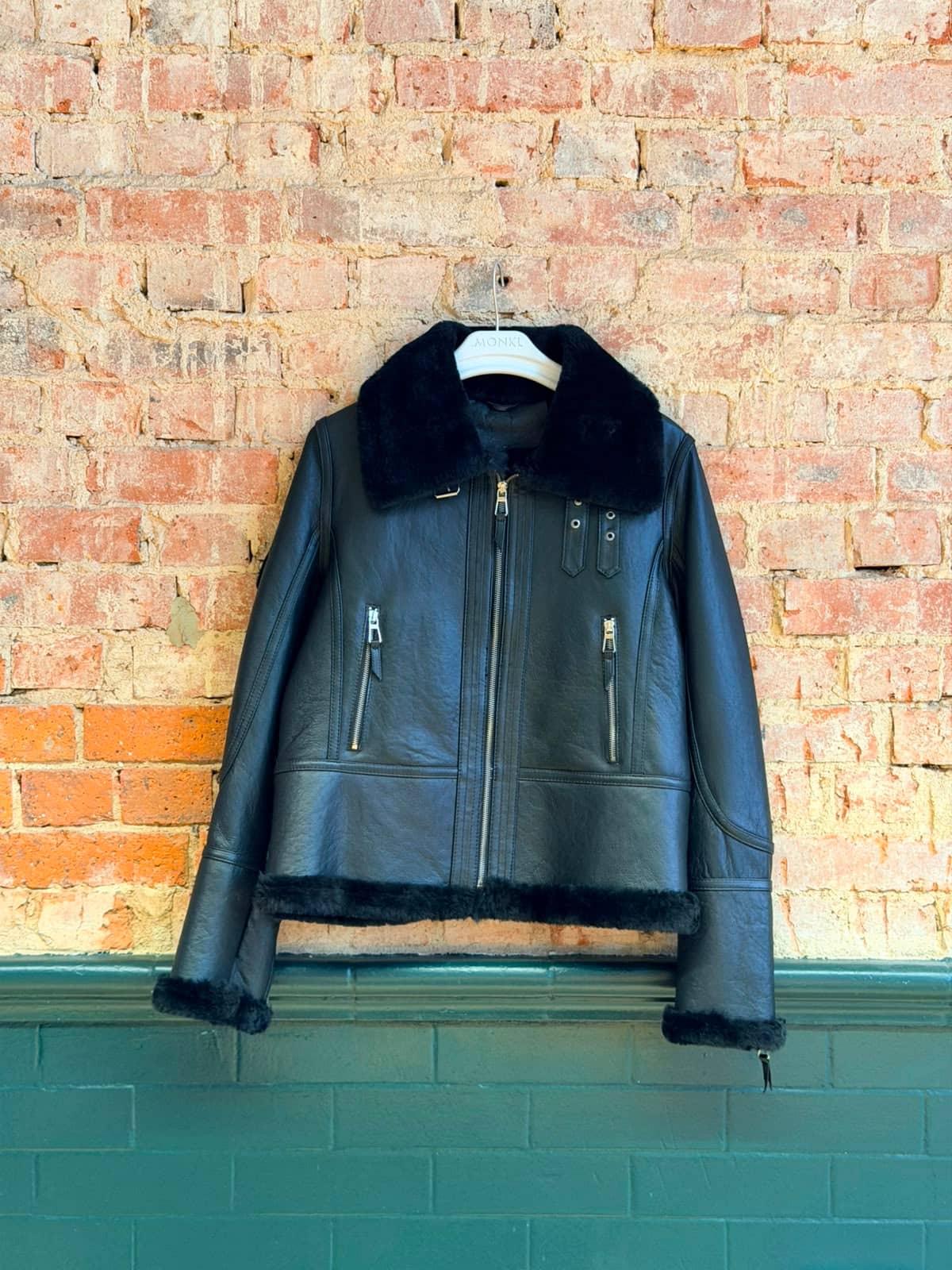Marylebone Shearling Flight — side profile showing shearling collar and leather grain