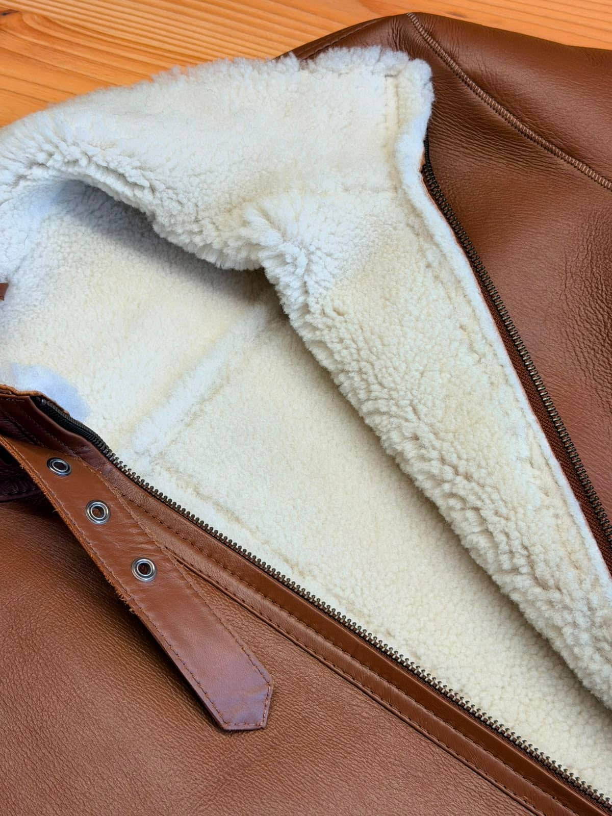 Pimlico Black Bomber — side profile showing shearling collar and leather grain