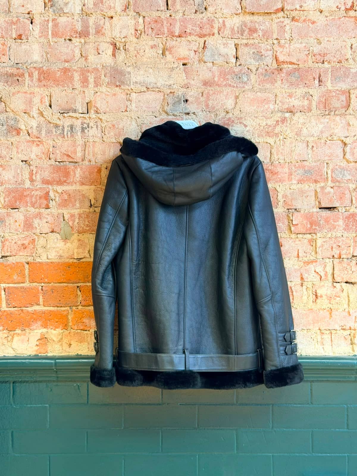 Berkeley Brown Shearling — side profile showing shearling collar and leather grain