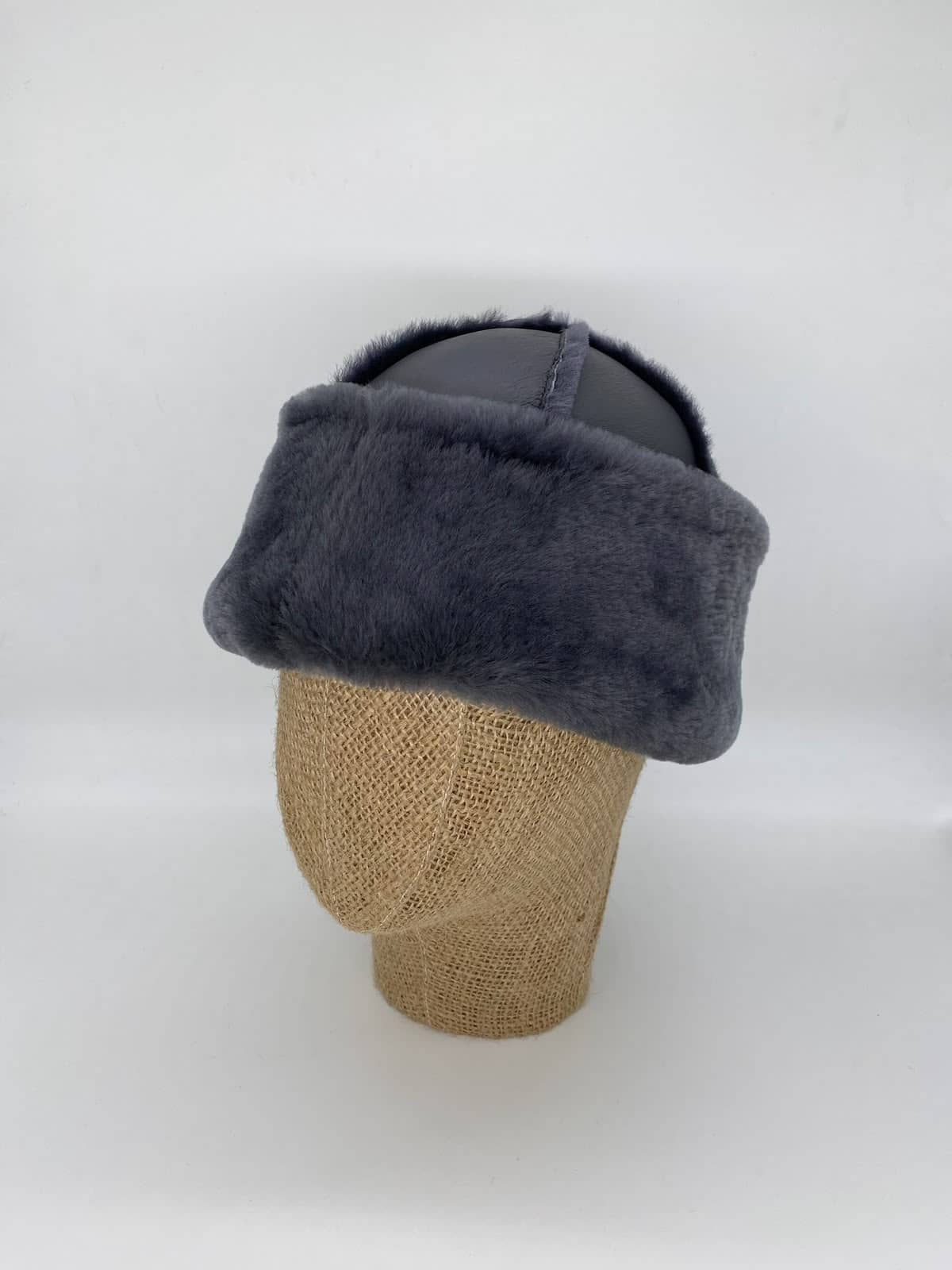 Mayfair Messenger — side profile showing shearling collar and leather grain