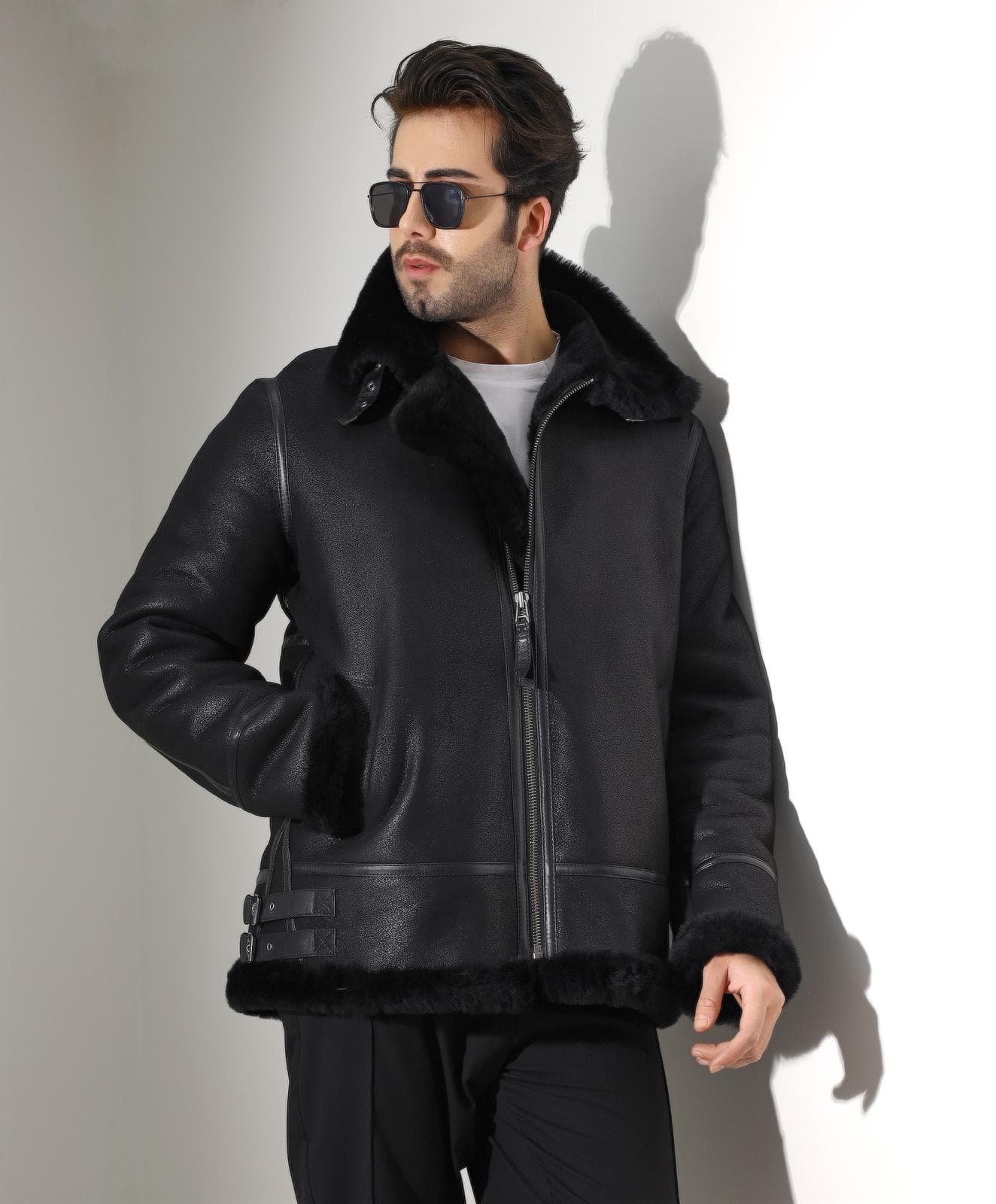 Styling a leather jacket with tailored trousers in London